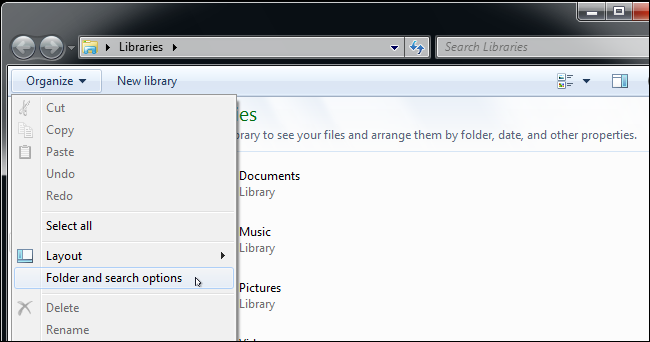 Click "Organize" and go to "Folder and Search Options." 