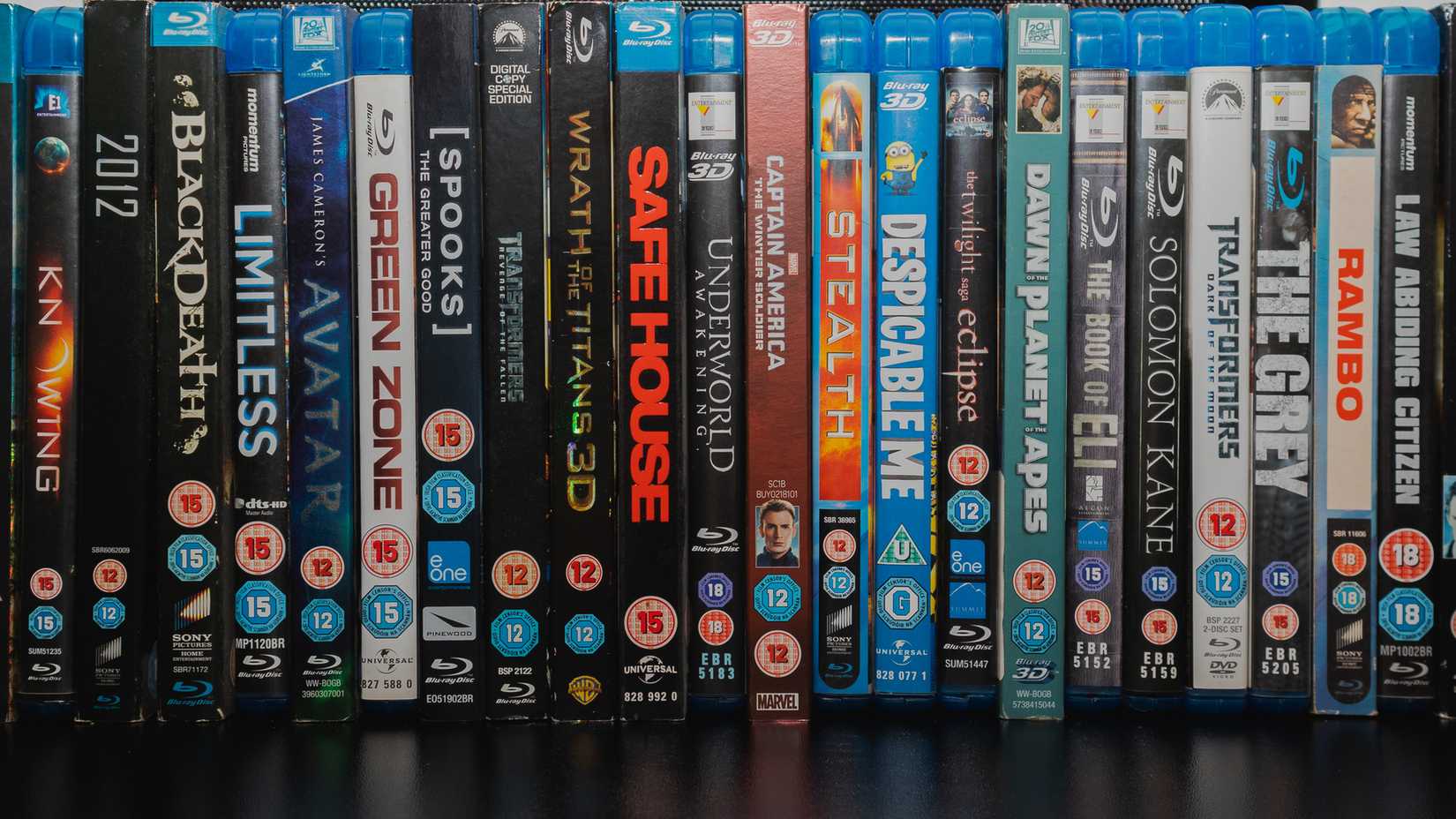 Collection of Blu Ray Movies stacked on a table
