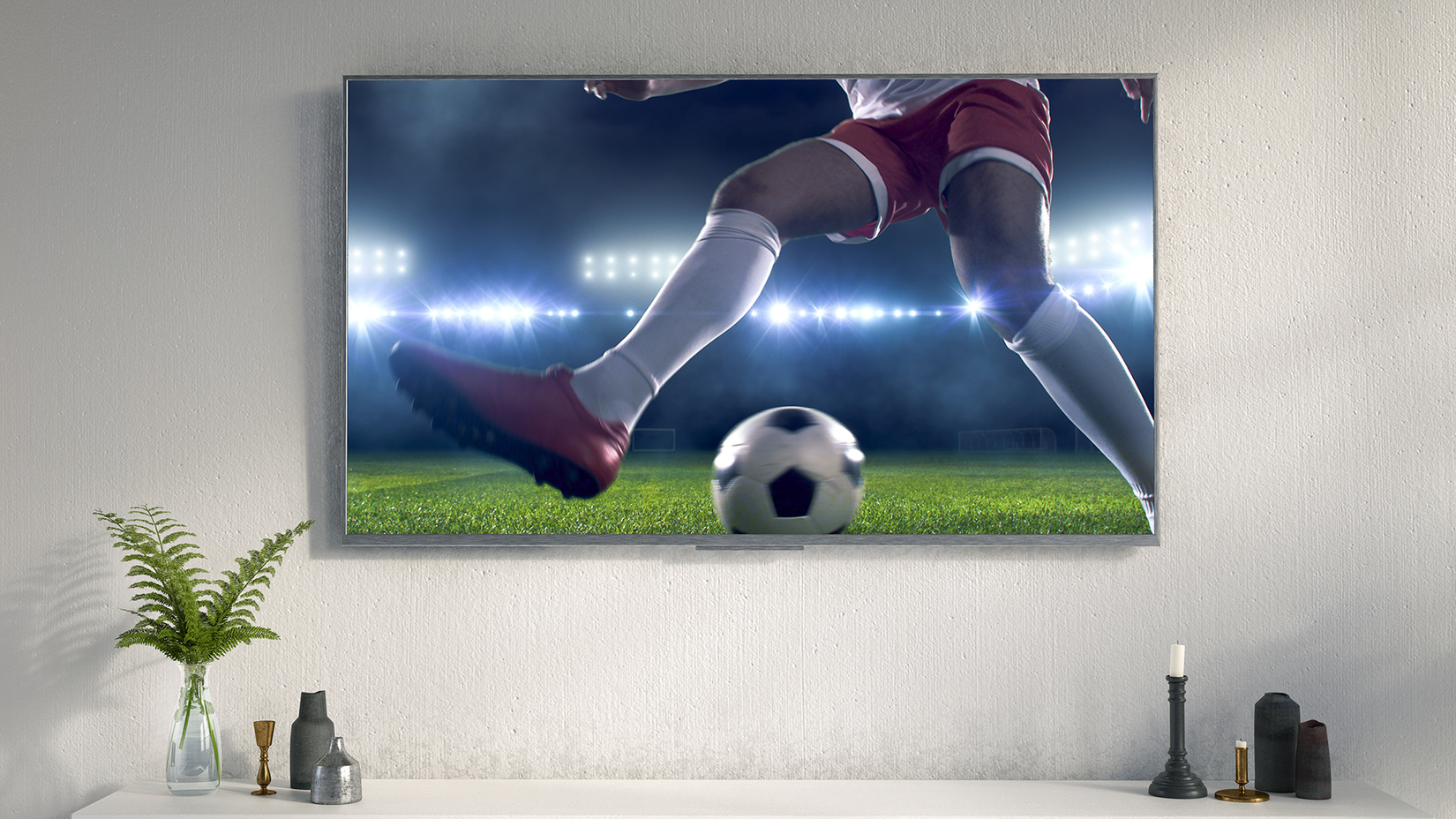 A beautiful 4K HDR TV hanging in a living room.