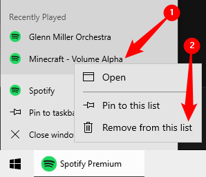 Right-click the Spotify icon on your taskbar, then right-click the song you want to remove and click &quot;Remove From this List.&quot;