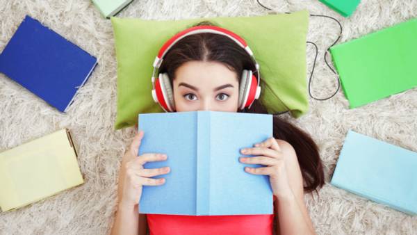 Girl listening to audiobook.