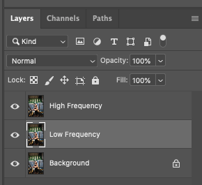 Layers panel in Photoshop with background layer, high frequency layer, and low frequency layer created.