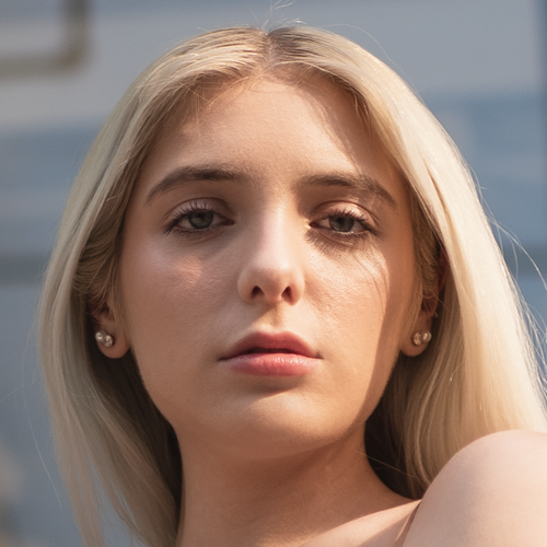 A woman's face after frequency separation editing.