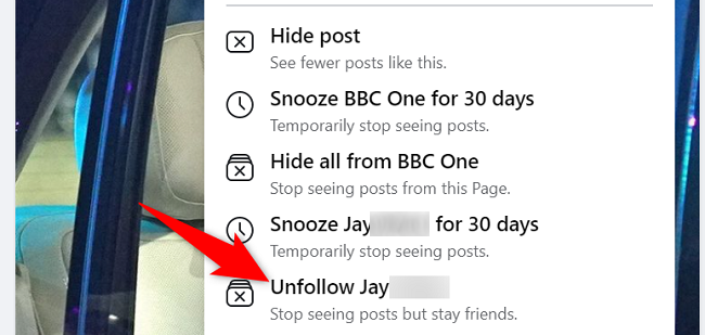 Choose "Unfollow [Person Name]" in the menu.