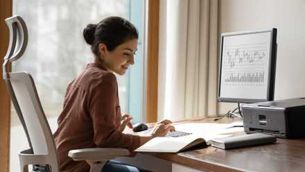 Woman working in home office.