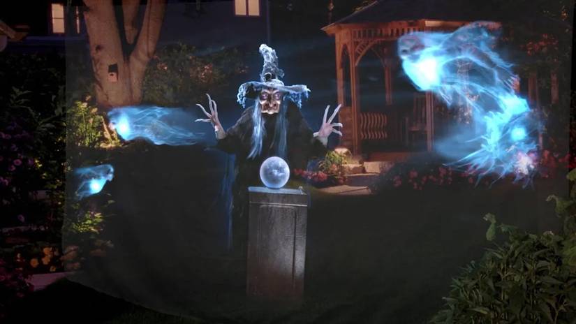 A witch projected on a lightweight piece of tulle fabric.