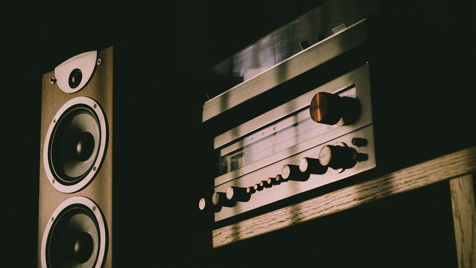 A moody photo of a vintage hi-fi system.