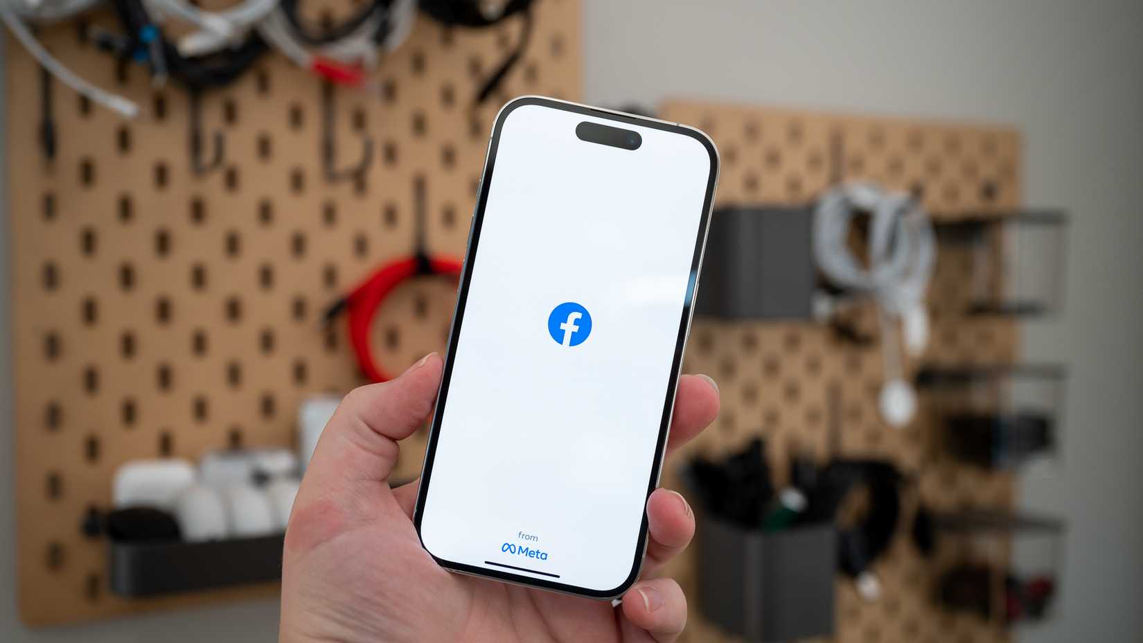 Facebook from Meta loading screen on an Apple iPhone 14 Pro.