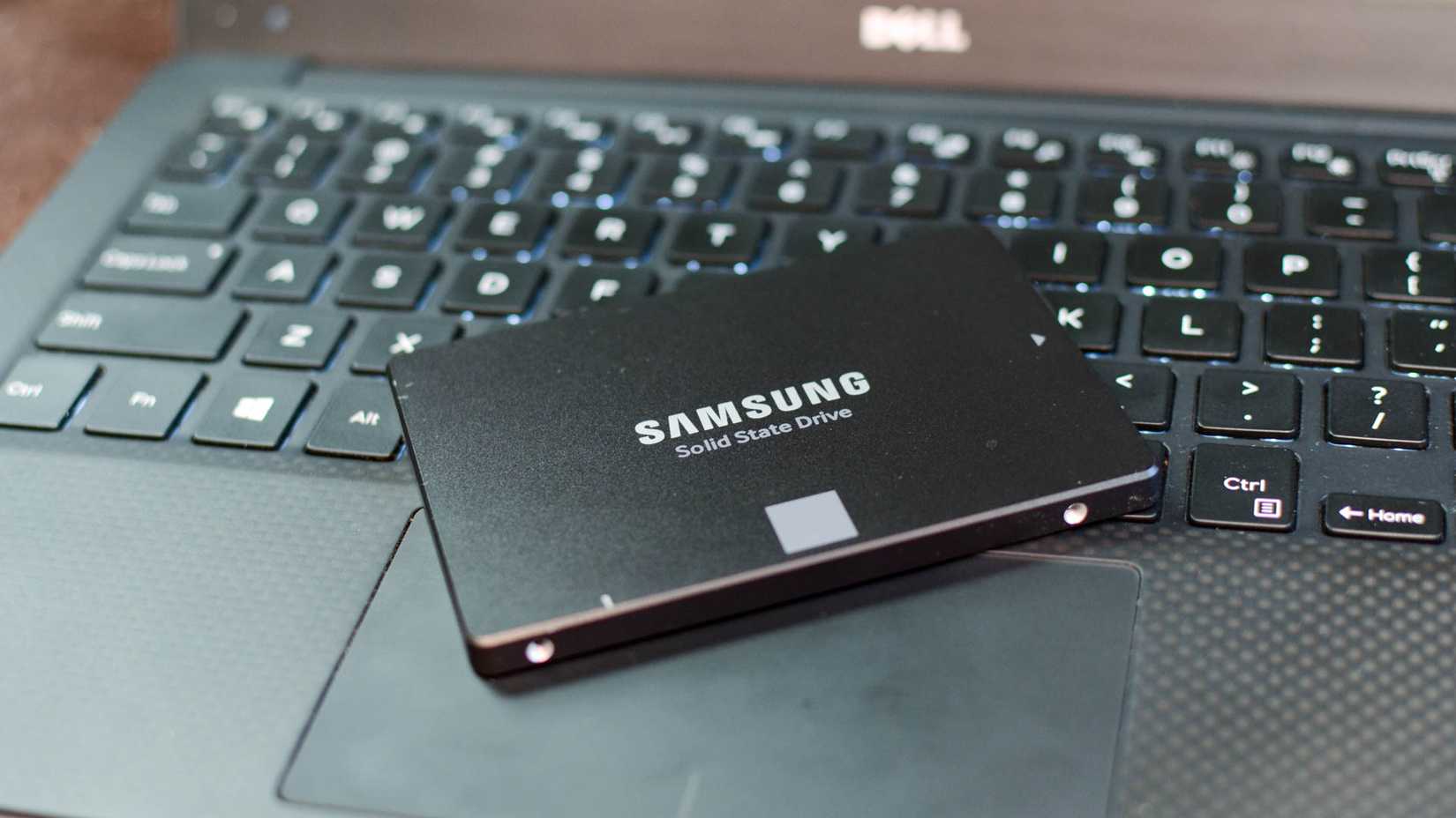 Samsung EVO SSD sitting on a laptop keyboard