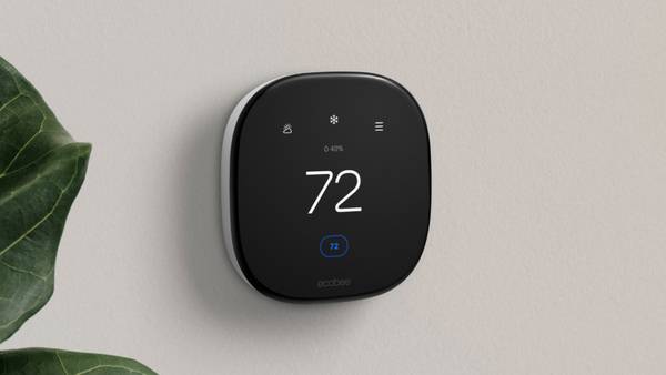 Photo of an Ecobee thermostat on a wall.