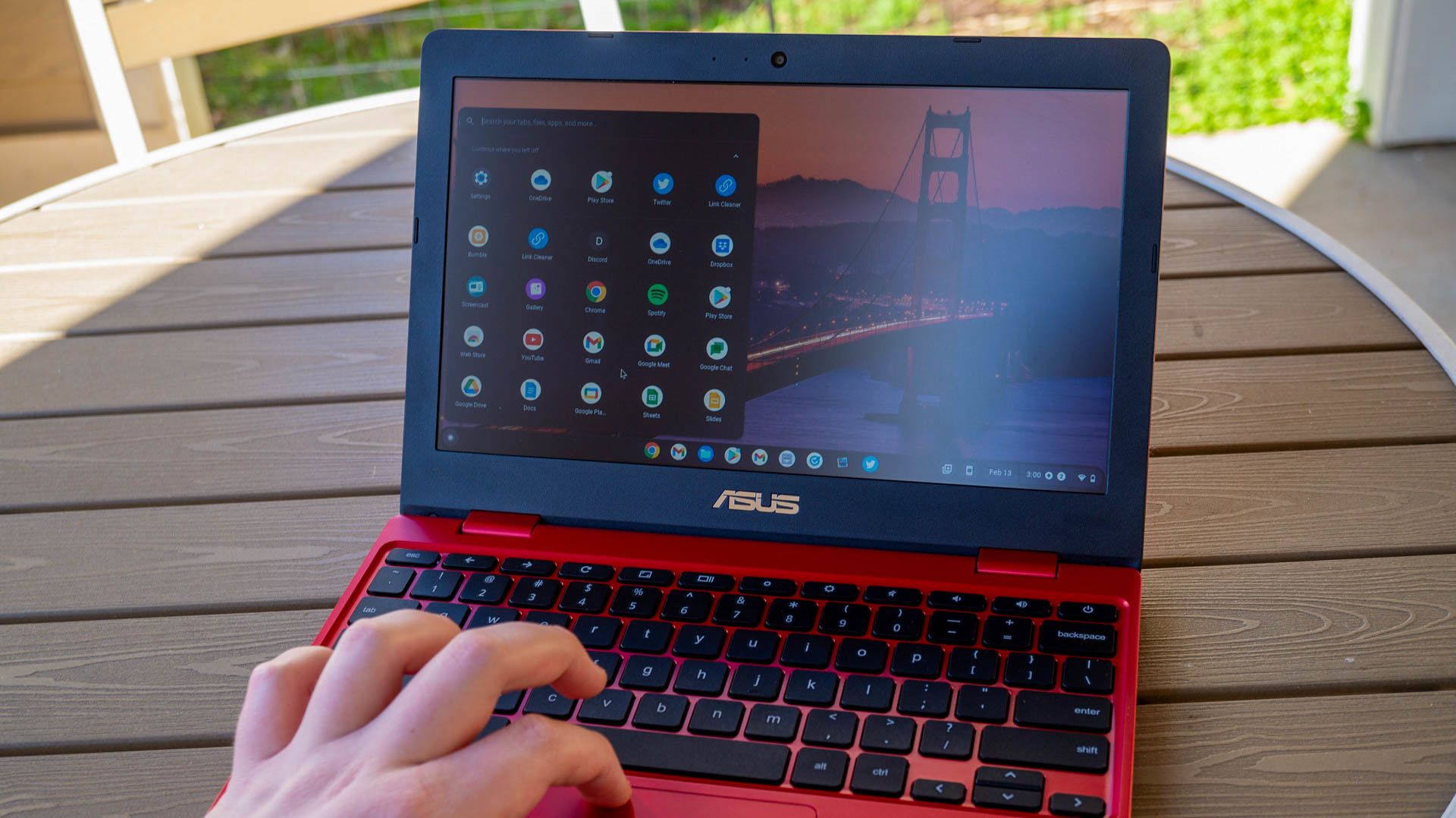 ASUS Chromebook 12 C223NA on an outdoor patio table.