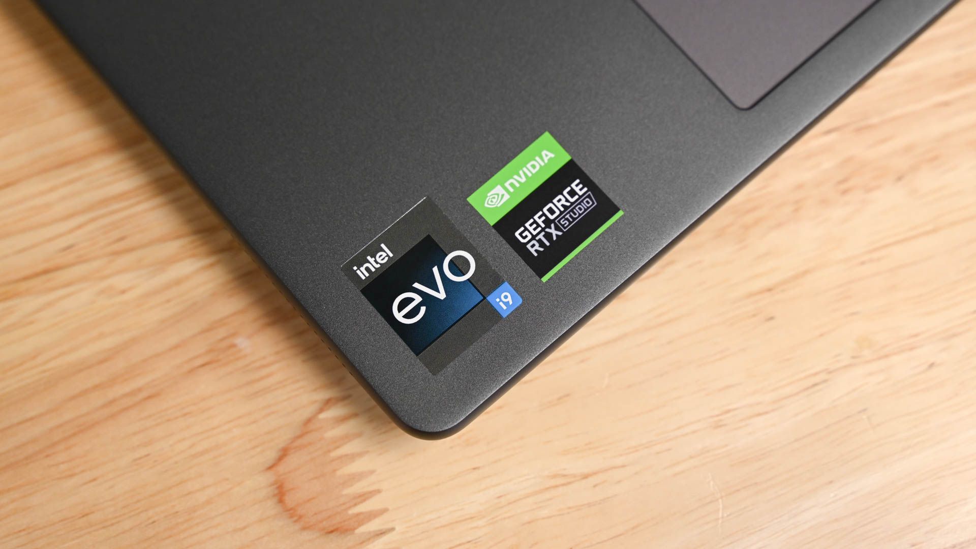 Intel Evo and NVIDIA GeForce RTX stickers on the Lenovo Slim Pro 9i 16-inch Gen 8.