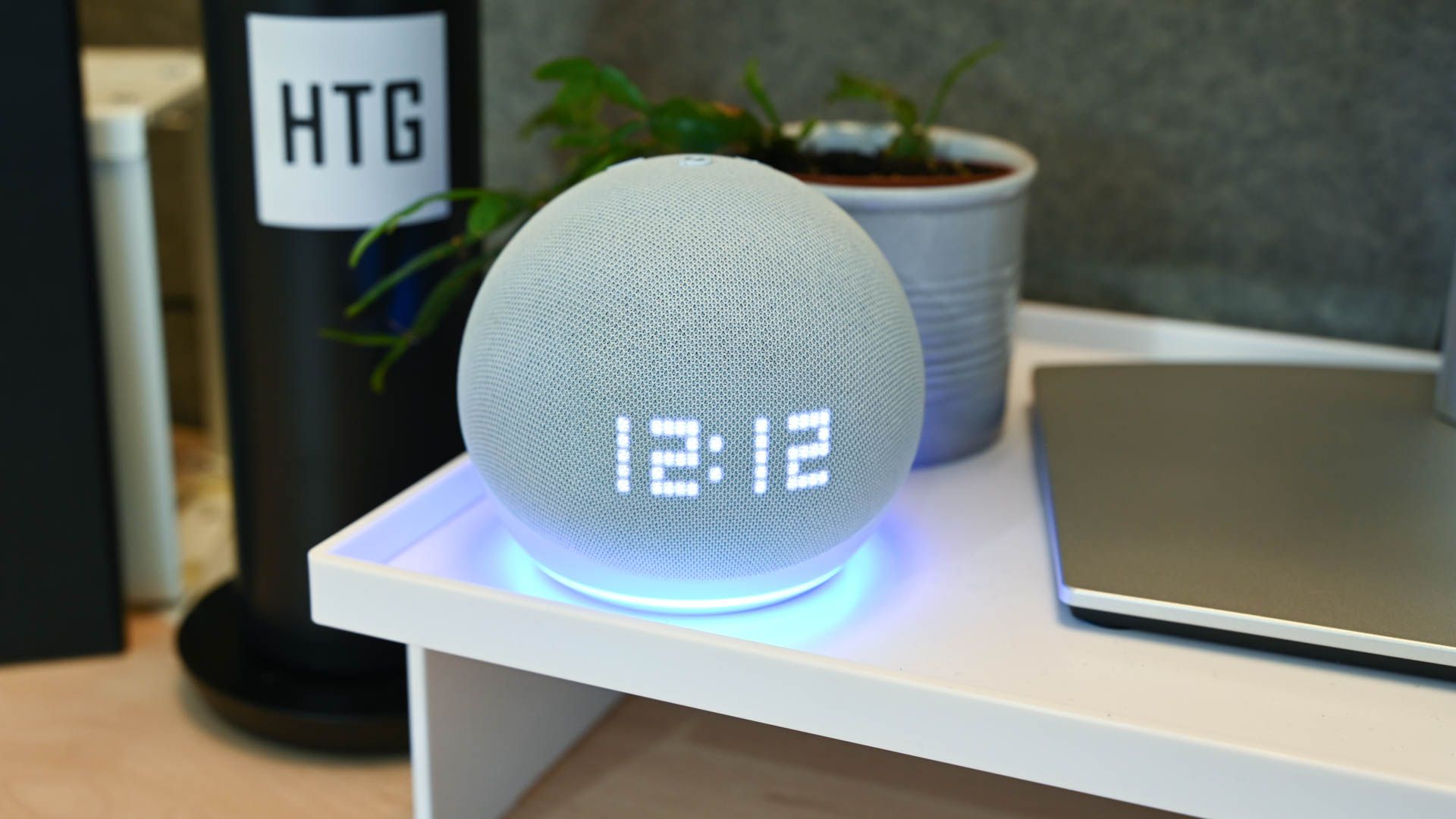 The Amazon Echo Dot 5th Gen displaying the time