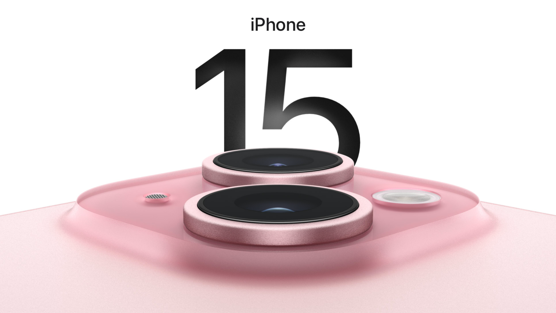 iPhone 15 in pink color with its cameras at the center of the frame