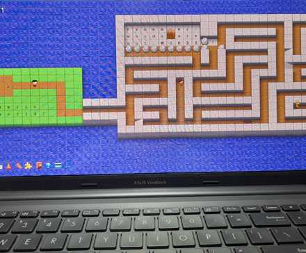 Vim adventures, a graphical adventure game to learn the popular text editor Vim, on a laptop screen.