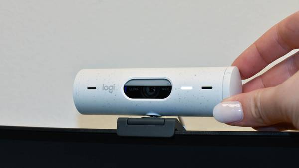 A webcam attached to the top of a screen. 