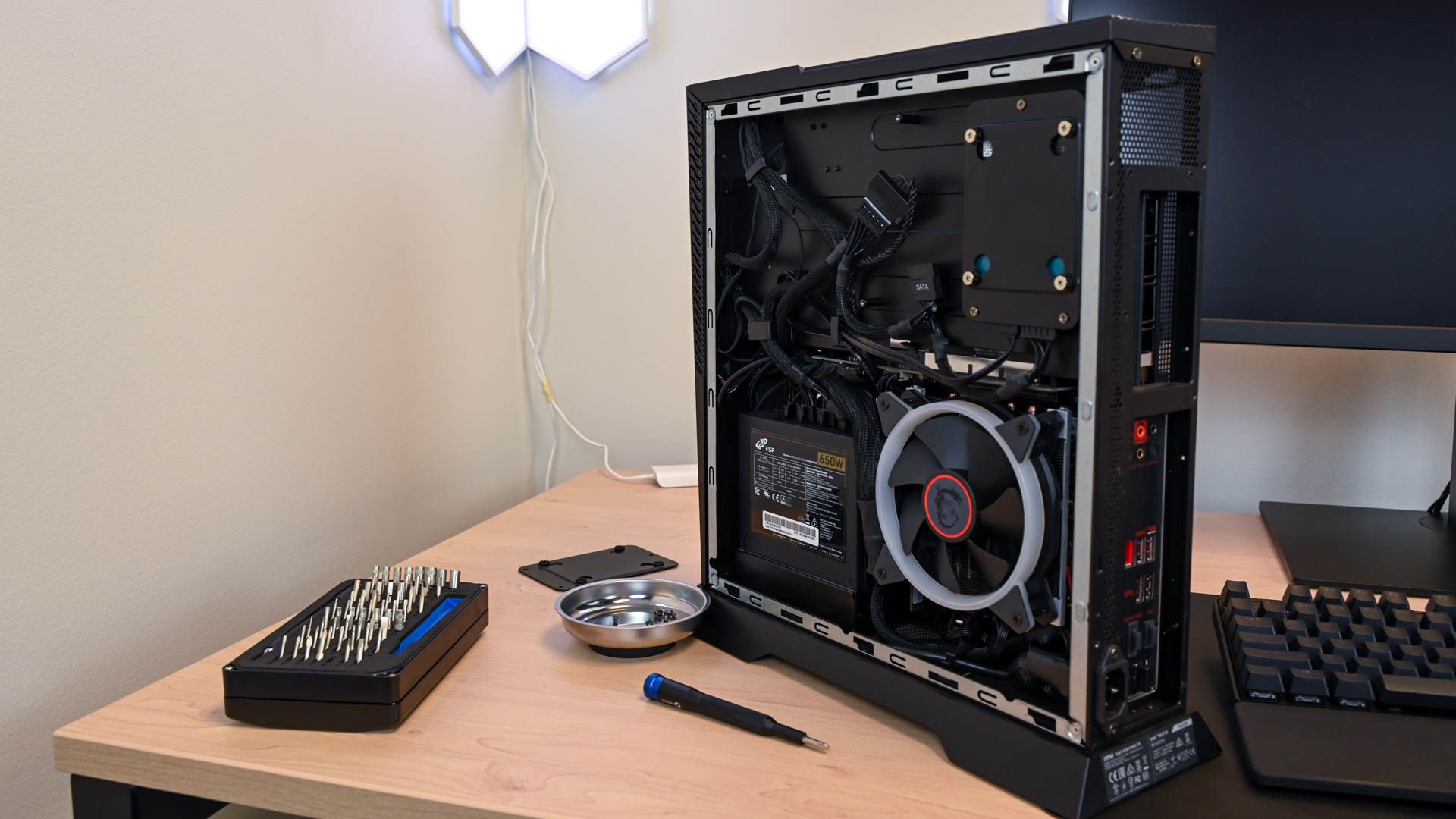 An opened PC with some of its components visible. 