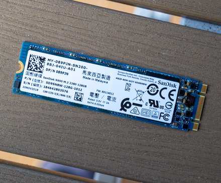 An NVMe SSD on a table.