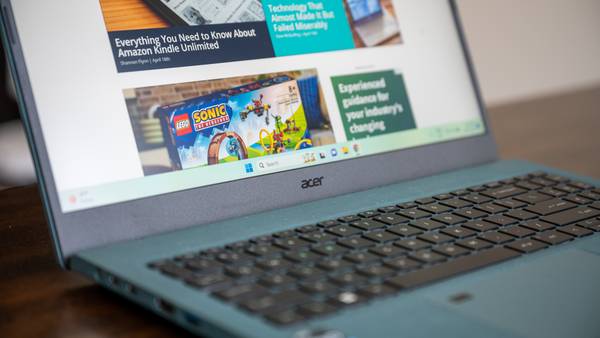 A Windows laptop by Acer placed on a table.