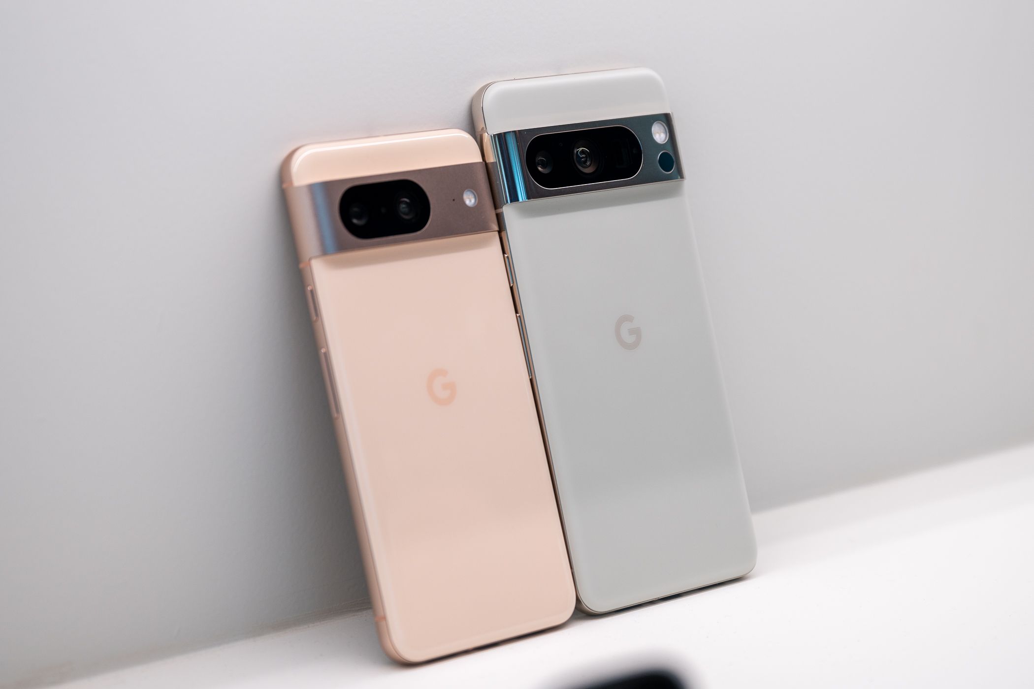 Google Pixel 8 and Google Pixel 8 Pro placed side by side.