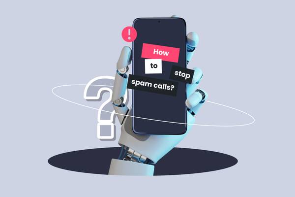 robot hand holding phone that says how to stop spam calls