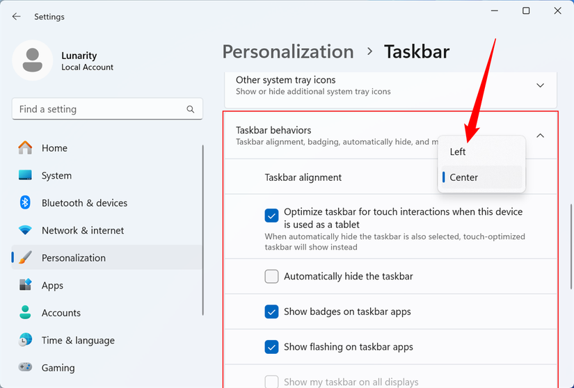 Click the drop-down menu and select "Left" or "Center" to reposition the Start button. 
