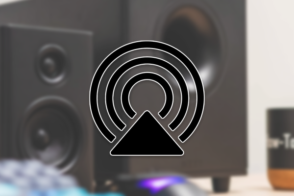 The AirPlay logo over a bookshelf speaker and subwoofer.