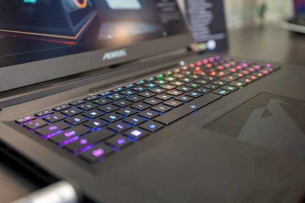 Close up of a green and yellow gaming laptop RGB keyboard