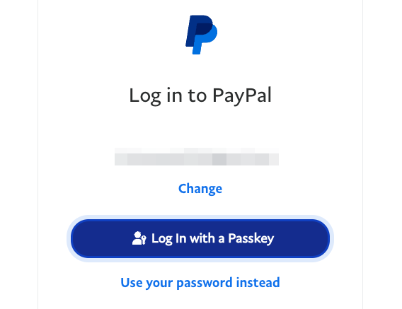 PayPal log in screen with the 'Log in with a Passkey' button.