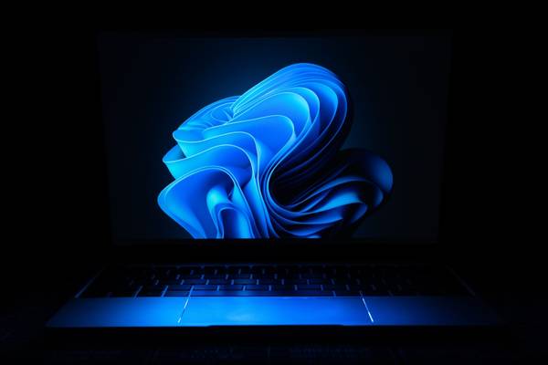 The Windows desktop wallpaper on a laptop with a dark background