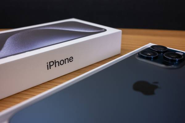 The Apple iPhone 15 Pro Max in its box.