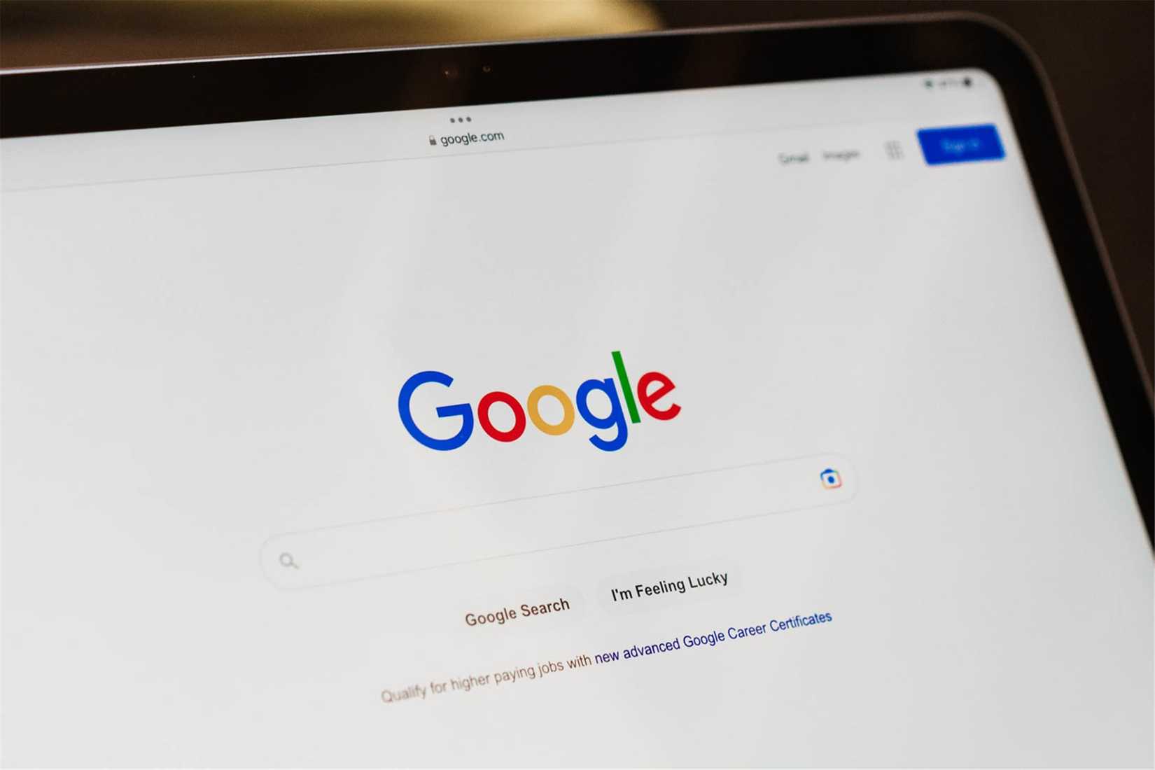 The Google homepage on a laptop computer.