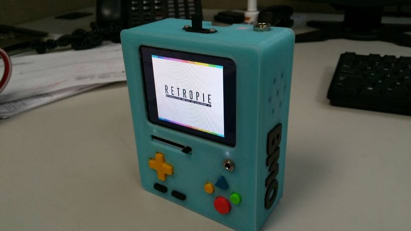 Raspberry Pi A+ case in the shape of BMO, character from Adventure Time, running RetroPie.