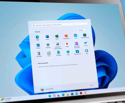 Windows 11 laptop with the Windows app drawer open in the Start menu.