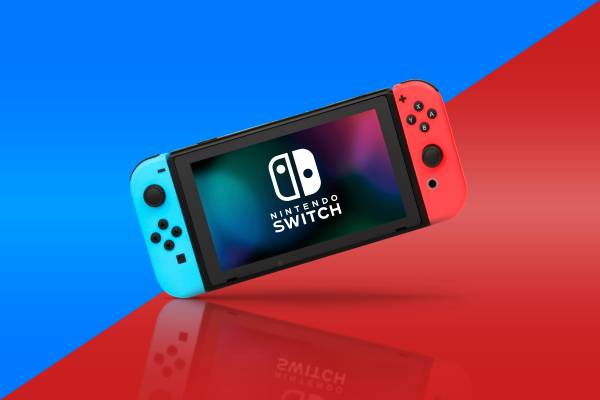 A Nintendo Switch with background colors divided into blue and green, matching the colors of the Joy-Con.