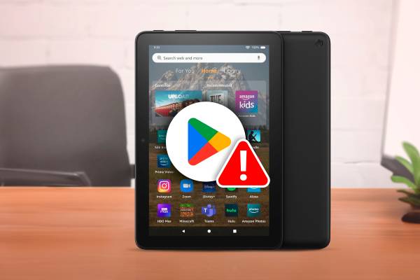 An Amazon Fire tablet with the Play Store logo on the front with a warning sign.