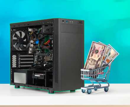 A computer case and a miniature shopping cart with some dollar bills.