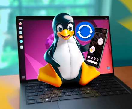 Ноутбук c Linux и Tux с Android-смартфоном