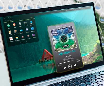 A laptop with a customized Rainmeter screen.