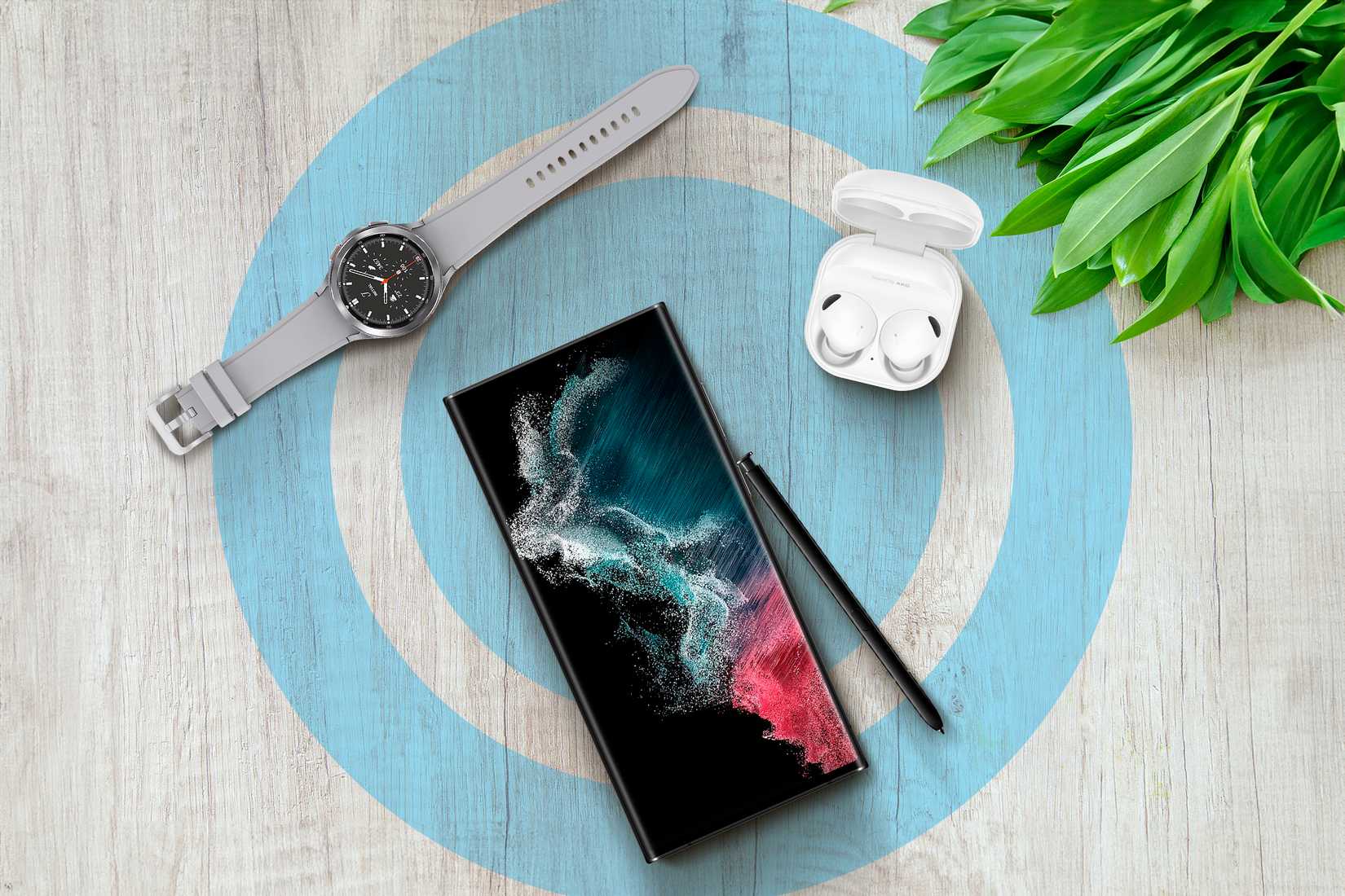 Samsung's ecosystem with a Galaxy Watch, an S22 ultra and a Galaxy Bud.