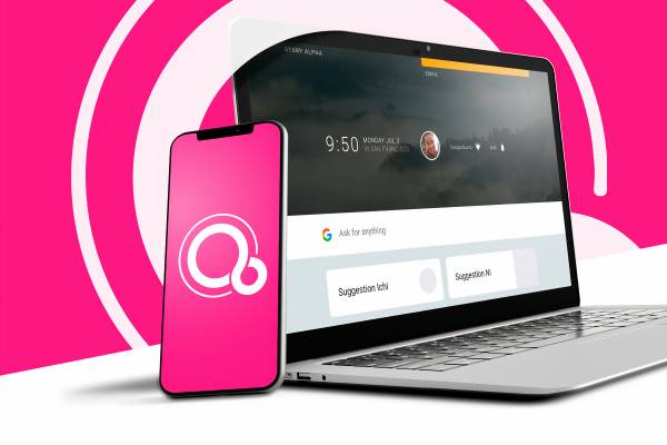 A phone with the Fuchsia OS logo next to a laptop.