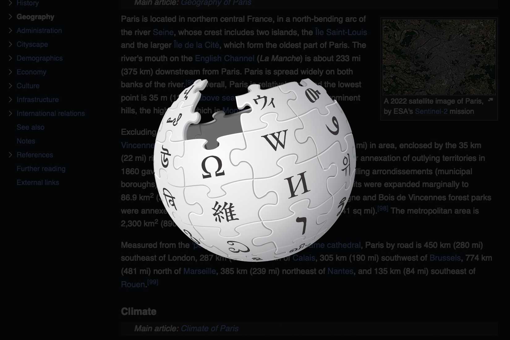 Logotipo da Wikipedia em uma captura de tela escura.