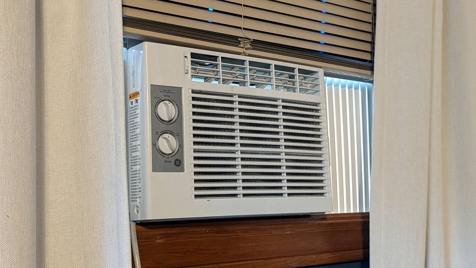 These Two Gadgets Make an Old Window Air Conditioner Smart
