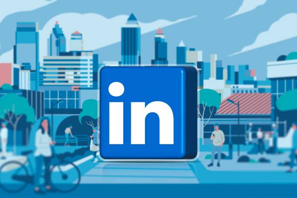 A city with some people on the street and the LinkedIn logo in the center.