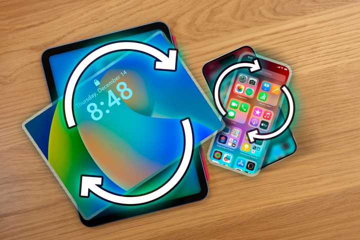 An iPhone and an iPad with the screen rotating.