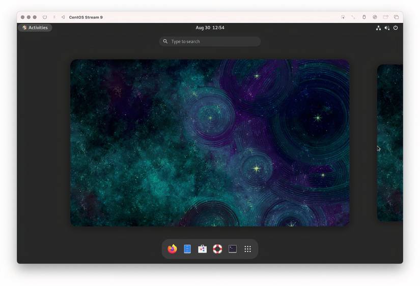 A new installation of CentOS open to the space-themed desktop.