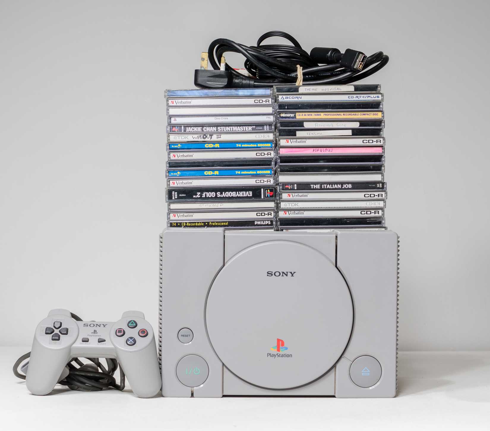 An original chipped modded sony playstation console with copied games from 1994.