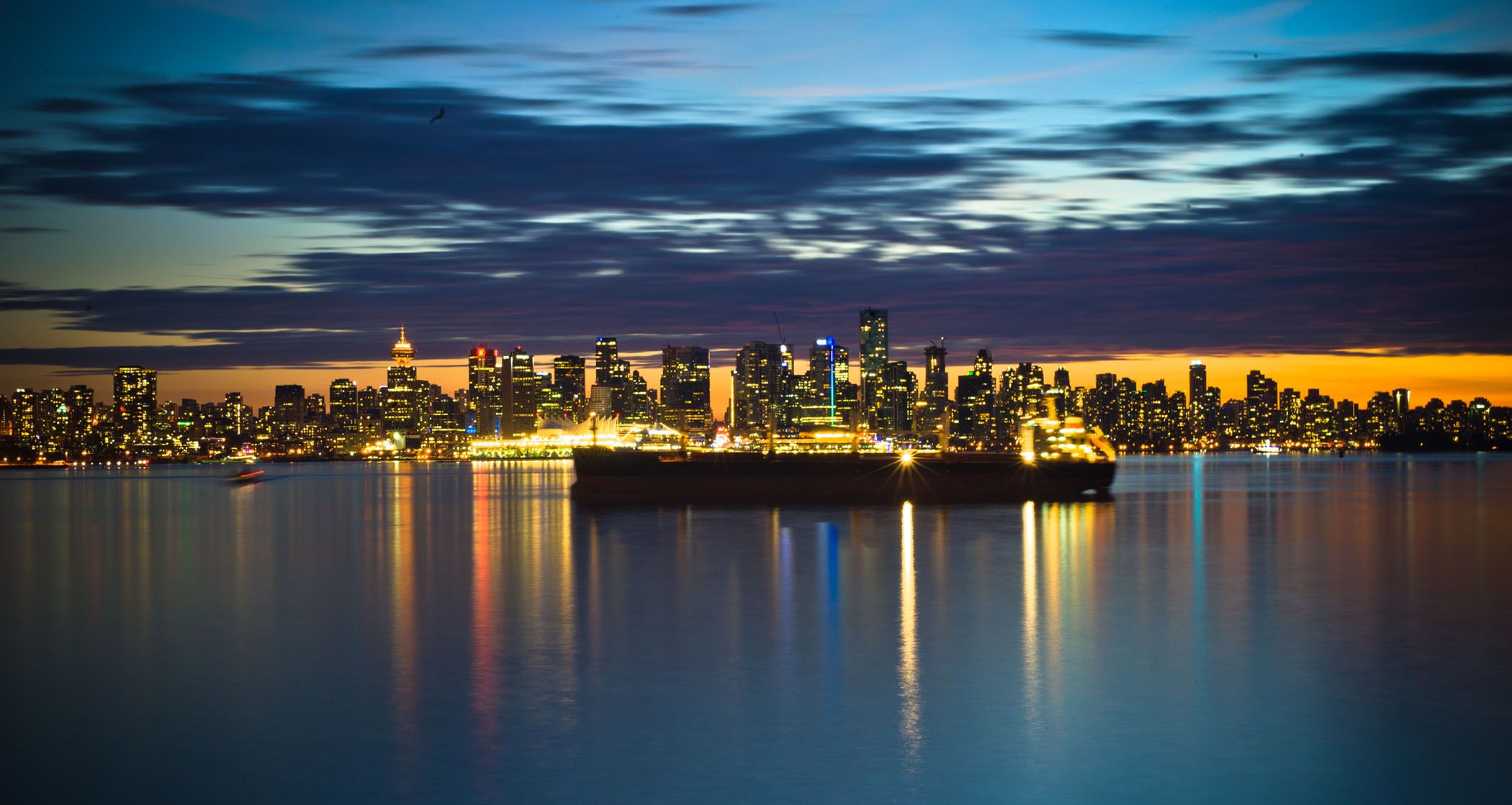 A night shot of Vancouver taken from across the harbour.