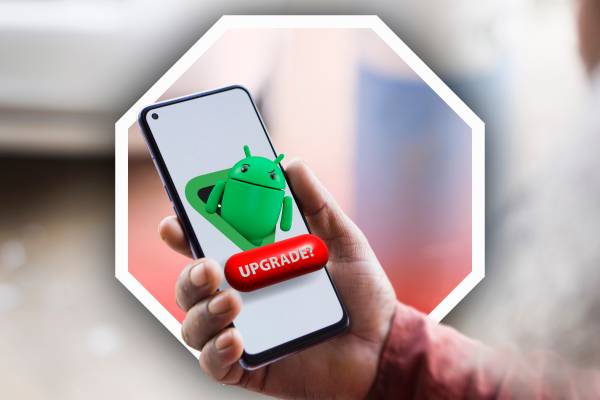 A person holding a phone with the Android mascot on the screen and a button that says 'Upgrade'.