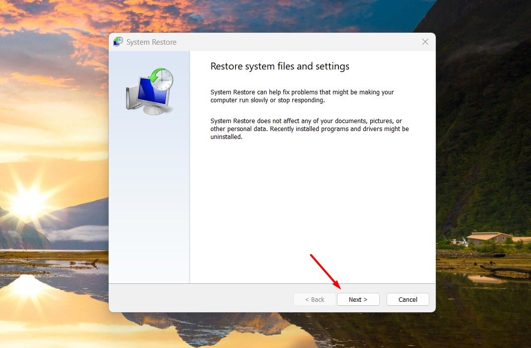 Next option in the System Restore window.